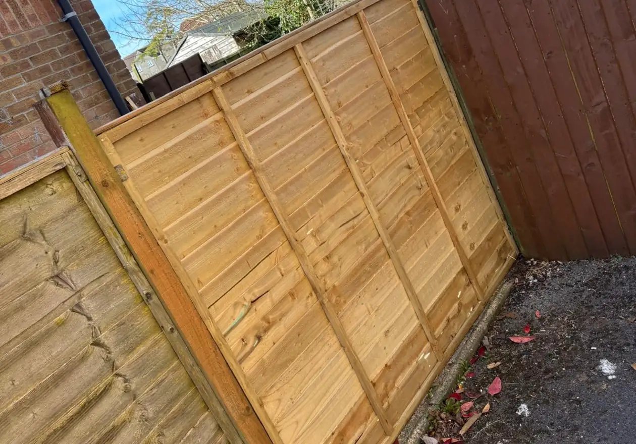 Finished fencing project in Bath showing durable wooden panels and professional installation