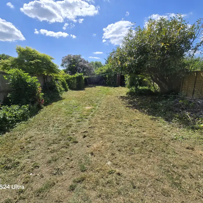 Cleared garden space after complete waste removal in Bath